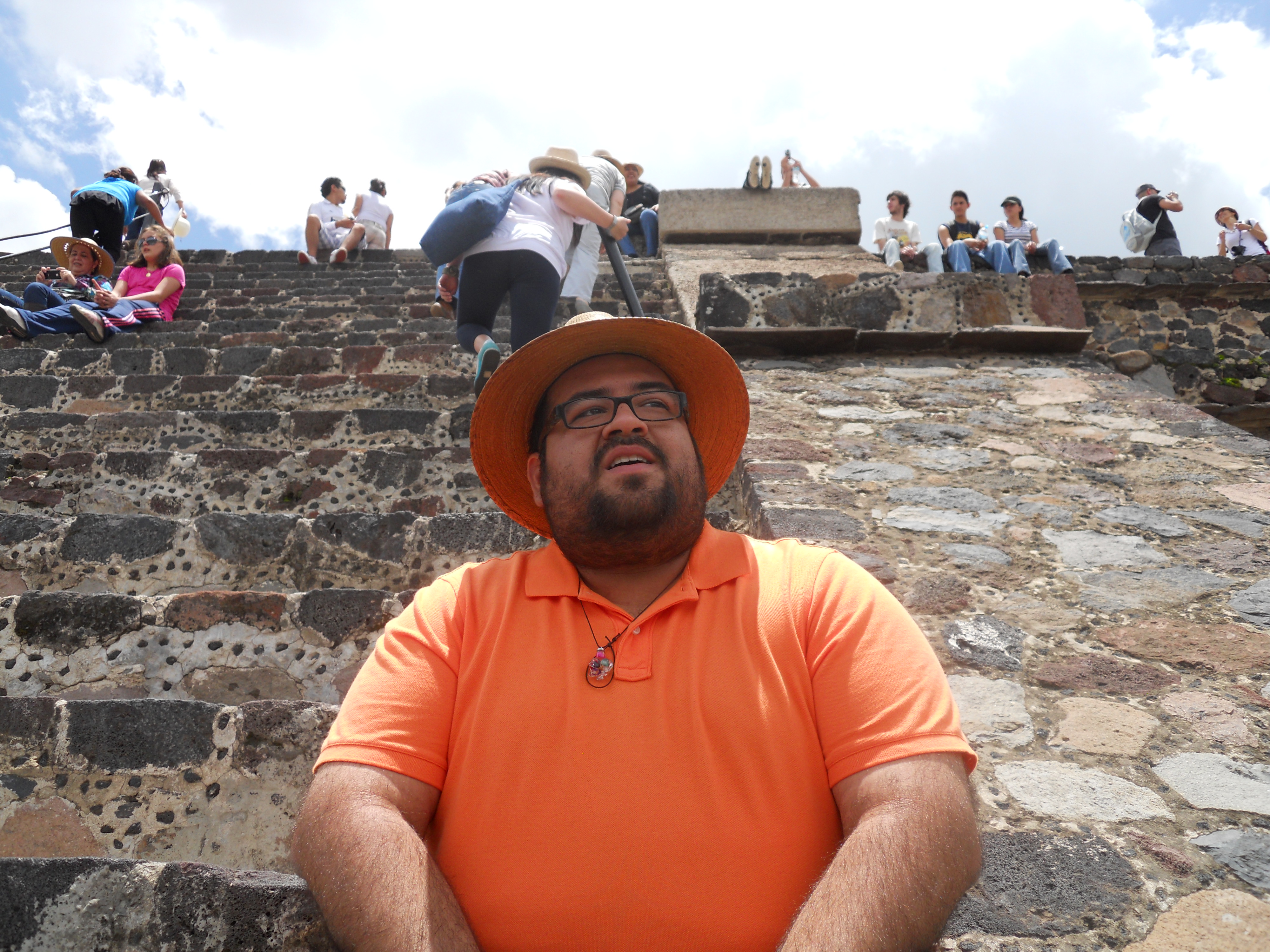 Image of instructor sitting atop Pyramid of the Moon-Teotihuacan